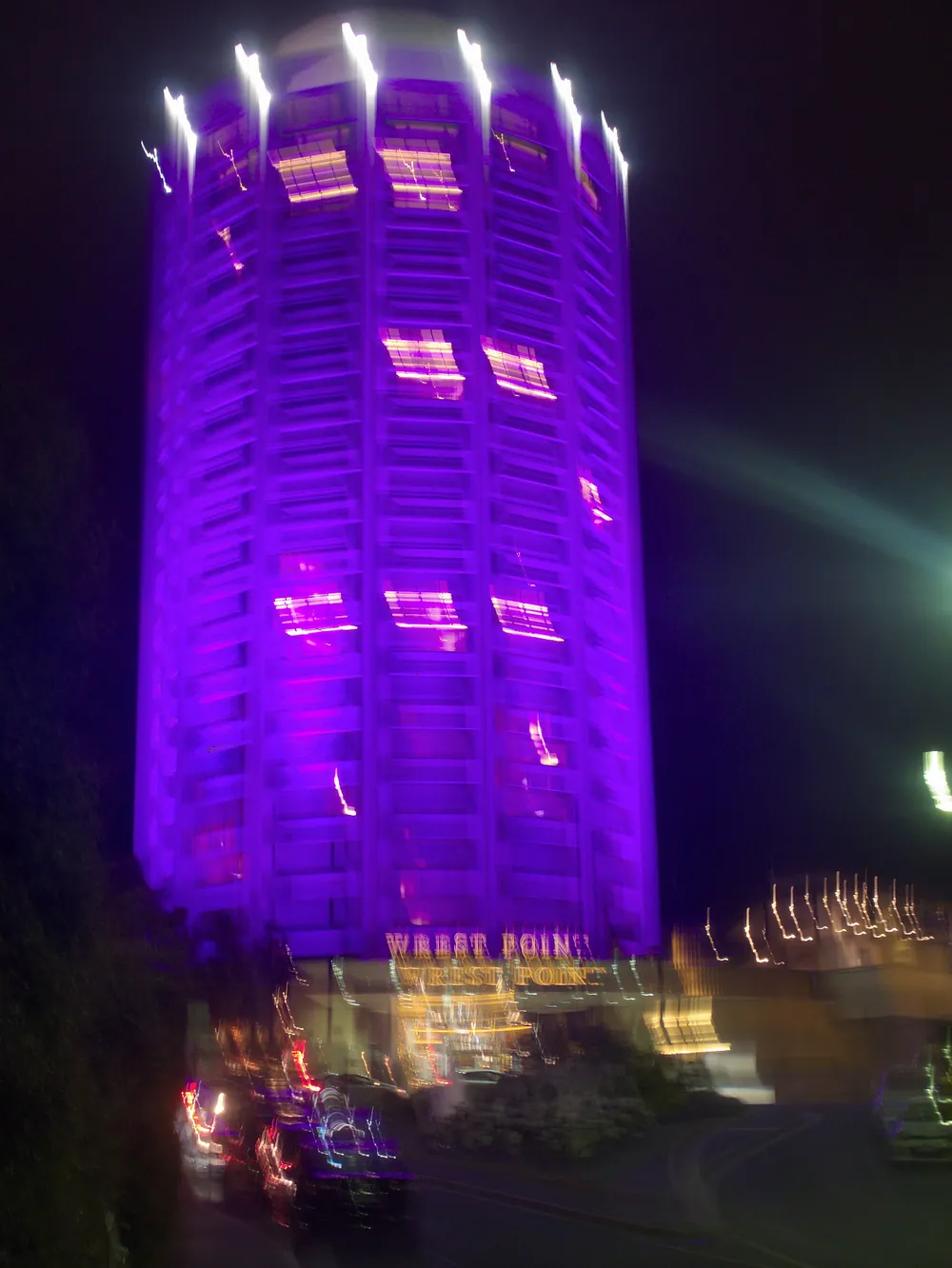 Wrest Point hotel tower illuminated at night in Hobart